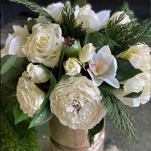 Luxurious white faux floral arrangement with cedar